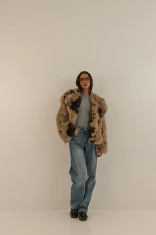 JEANS VITA ASIMMETRICA TWIST CON BOTTONI
