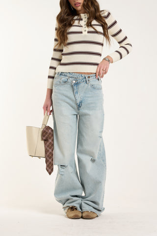 DISTRESSED CROSS ASSYMETRIC JEANS